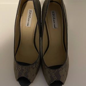 Lace covered high heel shoes by Zigi